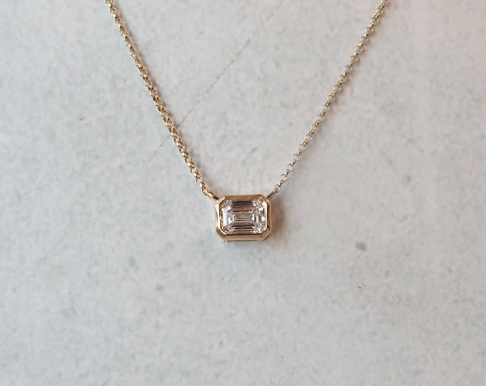 Bezel Set Necklace Emerald Cut