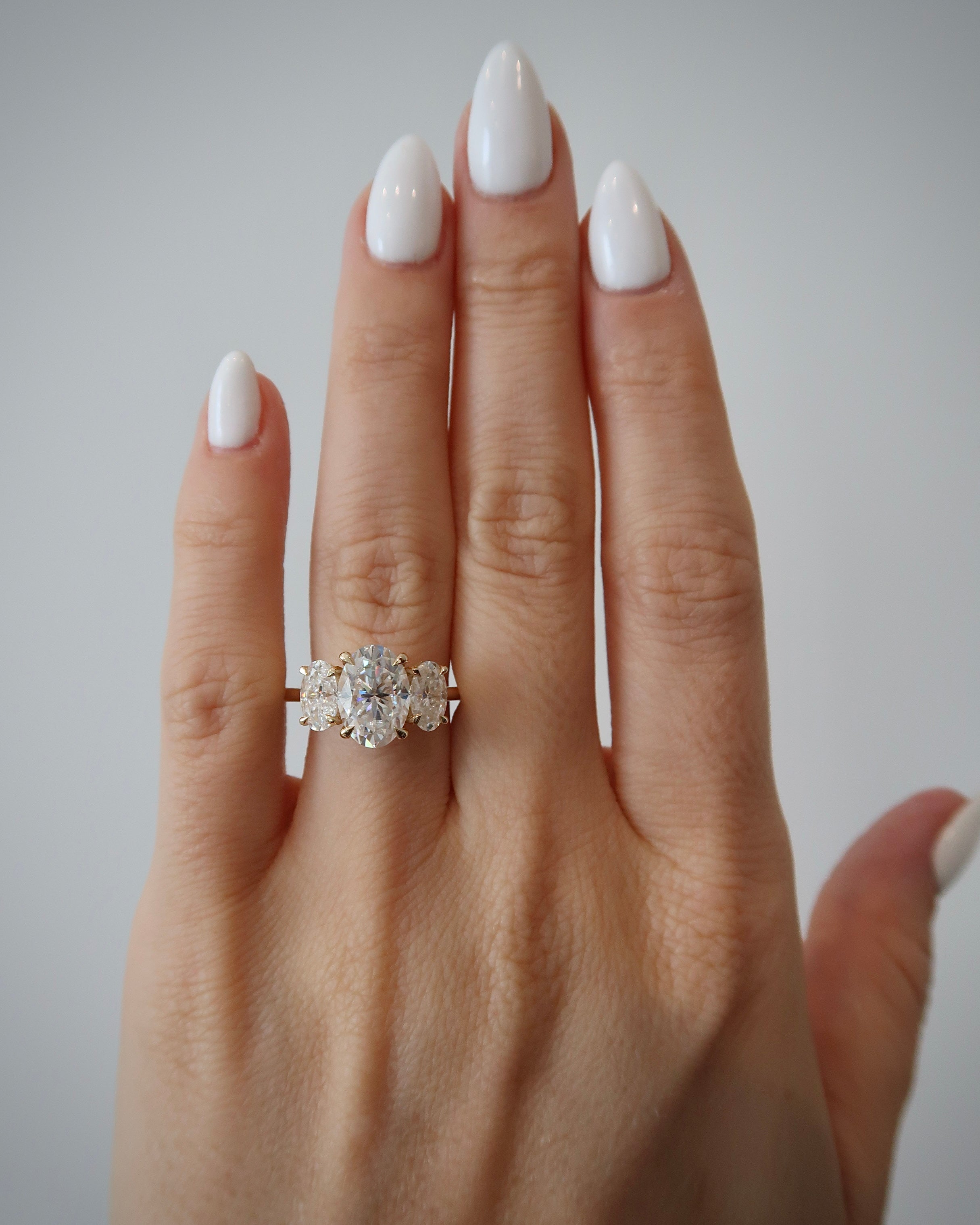 READY:  Shera Three Stone Oval Engagement Ring